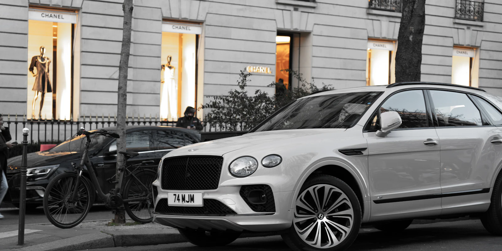 White Bentley Bentayga on a Paris street