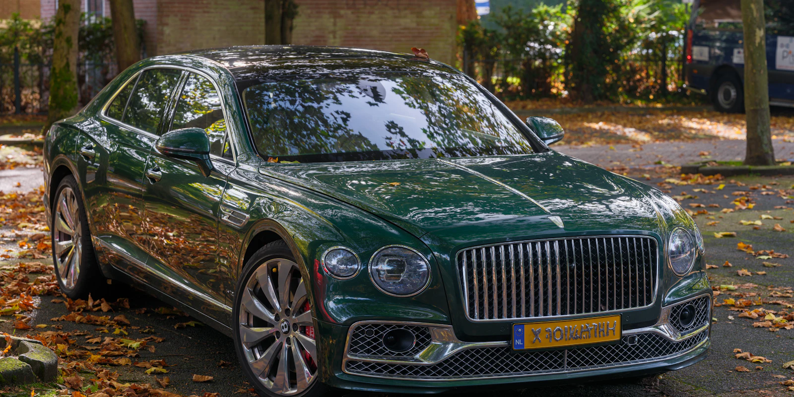 Green Bentley Flying Spur, front view