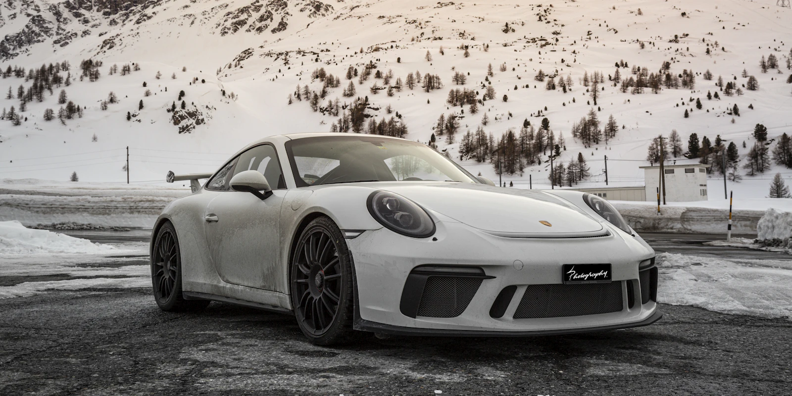 Porsche 911 GT3 on a snowy mountain road